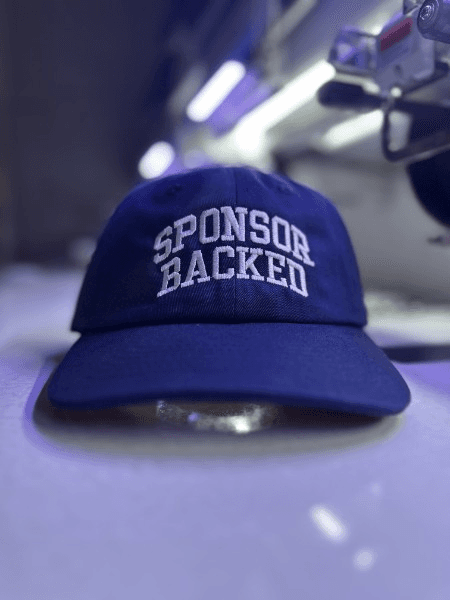 Actual Sponsor Backed stitch-out off the 15-needle commercial embroidery head at the Sponsor Backed Dallas Atelier